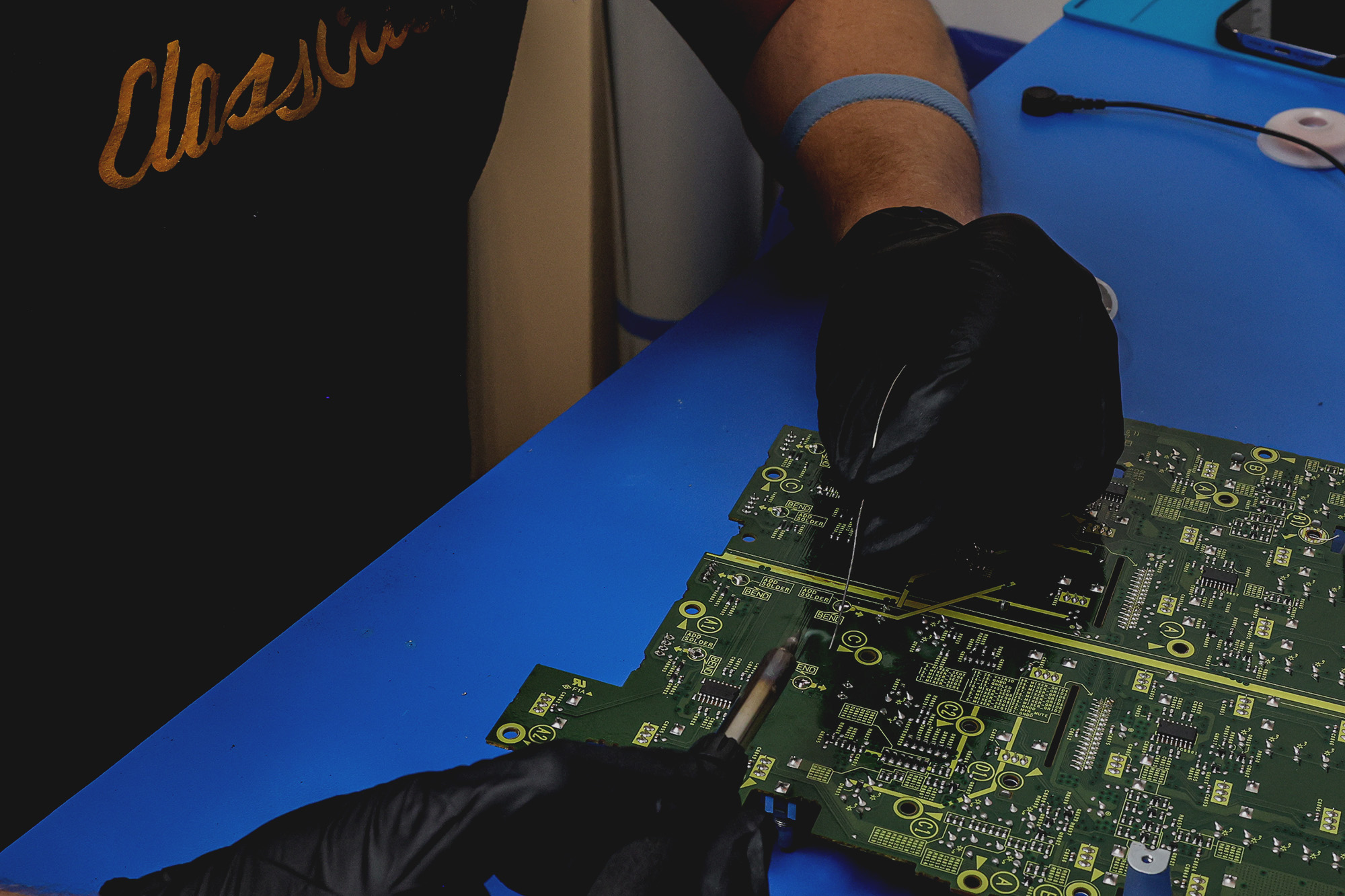 Broken record player being repaired